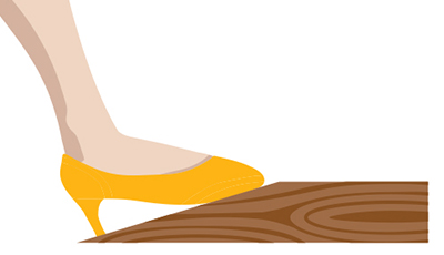 In this illustration, a woman's feet rest atop a footrest.