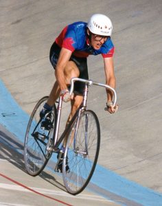 Jay Pratt on a steeply banked oval track – or velodrome – at the University of Alberta.