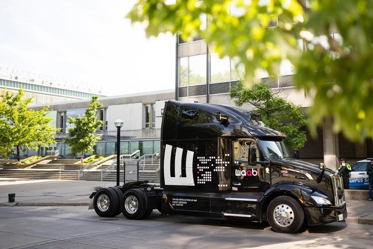 Waabi truck parked outside of Sidney Smith Hall.