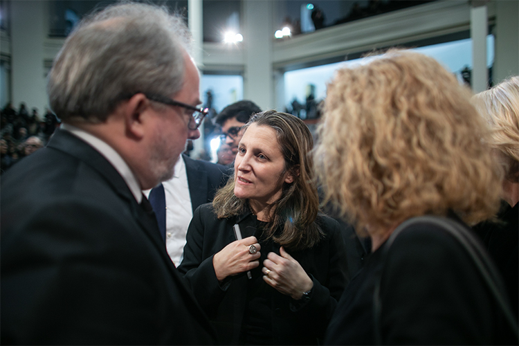 Deputy Prime Minister Chrystia Freeland speaks with David Palmer, U of T ’s vice-president, advancement, and Cheryl Regehr, vice-president and provost.