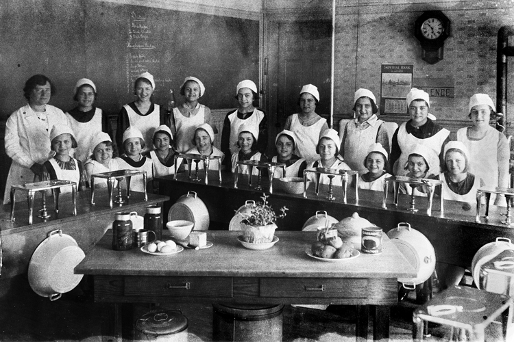 Group photo of students in a household science class at Clinton in the 1920s