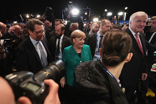 Angela Merkel speaking to the press.