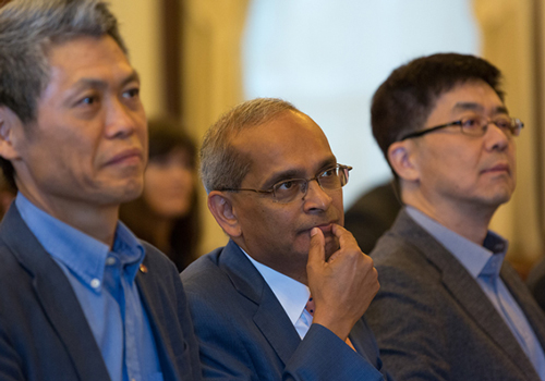 Vivek Goel, U of T's vice-president of research and innovation, I.P. Park, the president and CTO of LG Electronics (right), and Peter Kim (left), senior vice-president, artificial intelligence.