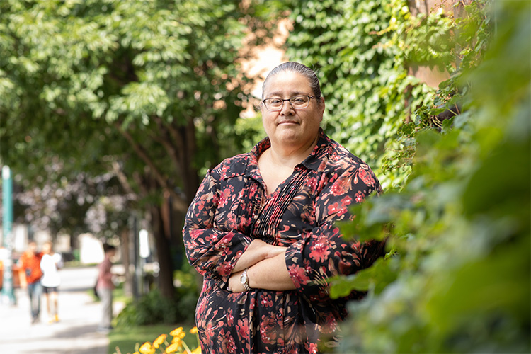 Susan Hill in front of trees