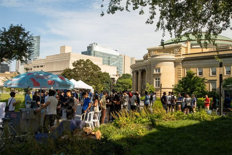 The Toronto Tech Week Lawn Party in front of convocation hall.