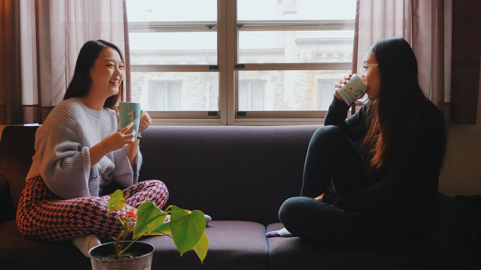 students chatting in dorm