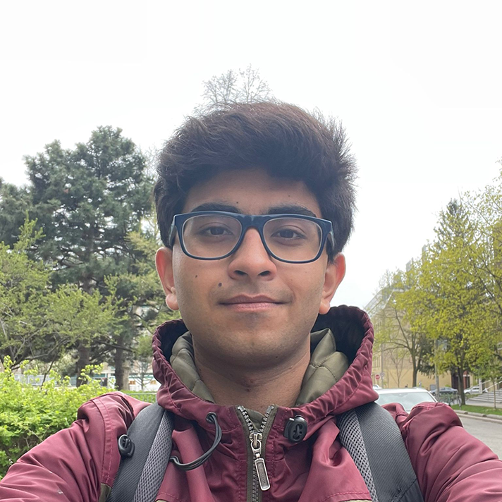 Selfie of Aditya outdoors 
