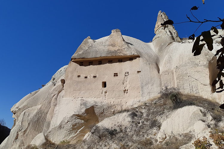 Domestic dwellings carved into volcanic 