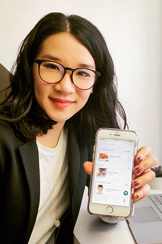 Catherine Chan showing an app.