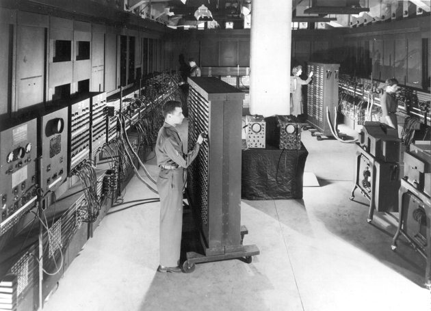 A man and two women working on th ENIAC