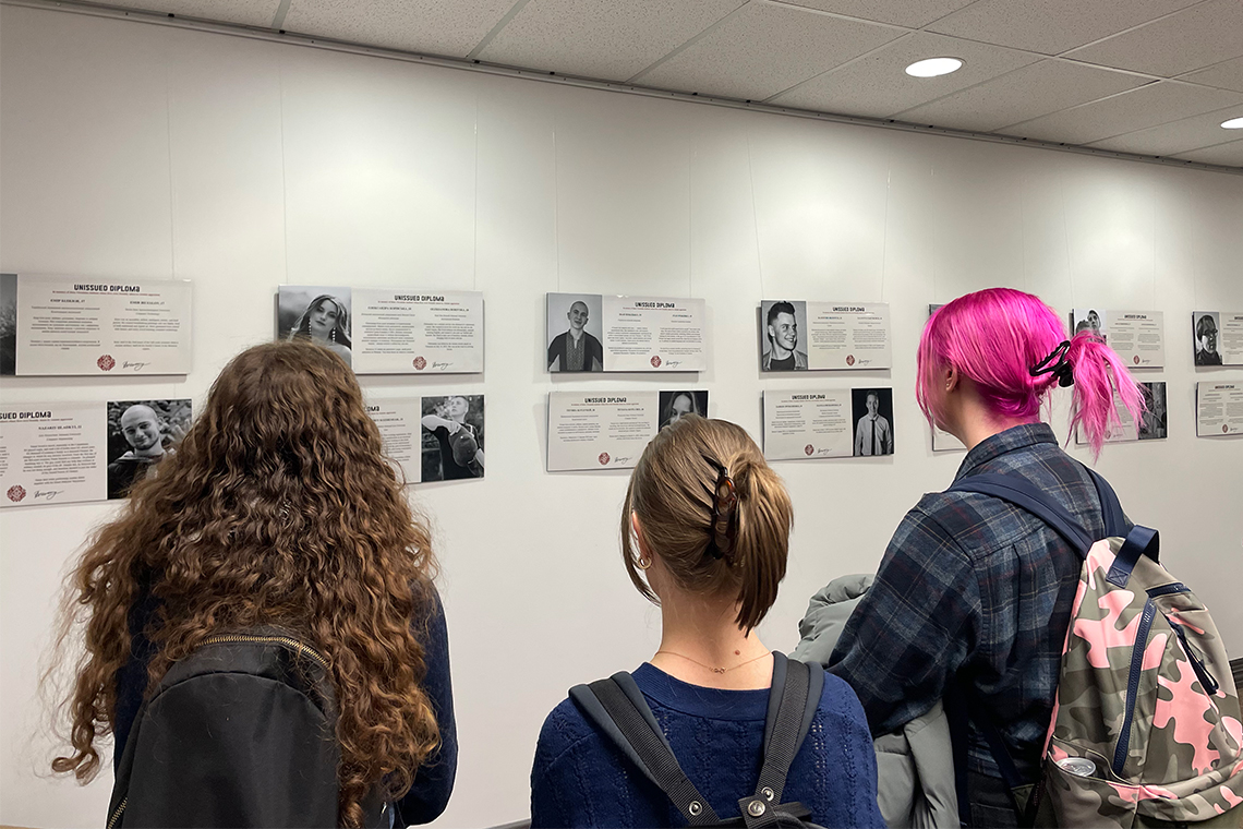Students view the exhibit