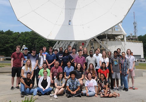 Kanaan and fellow interns standing outside at the Goddard Spaceflight Center.