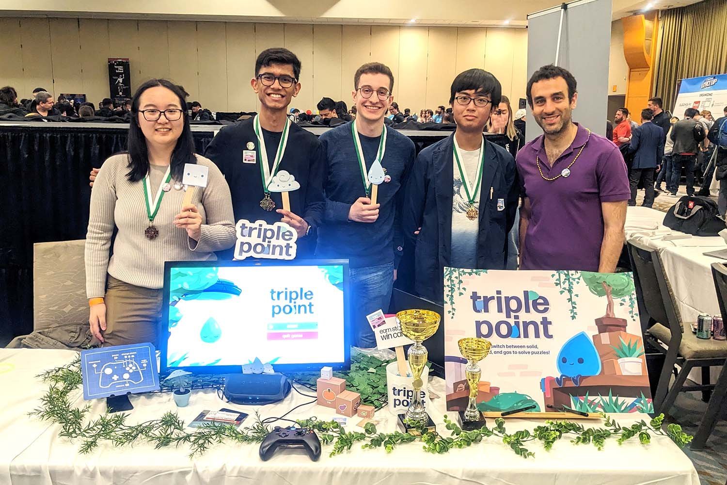 University of Toronto computer science students Chrisee Zhu, Fenil Patel, Ethan Moran and Elliot Chen with instructor Elias Adum at the Level Up Showcase on April 19, 2023.