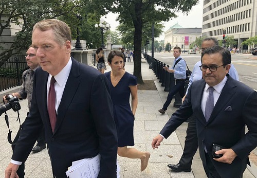 Politicians walking into NAFTA negotiations in Washington.