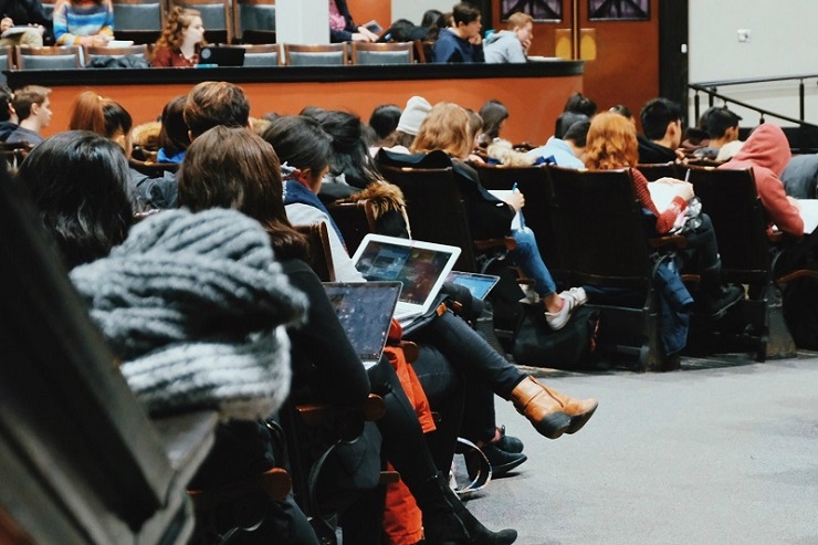 Students attending a lecture in Convocation Hall