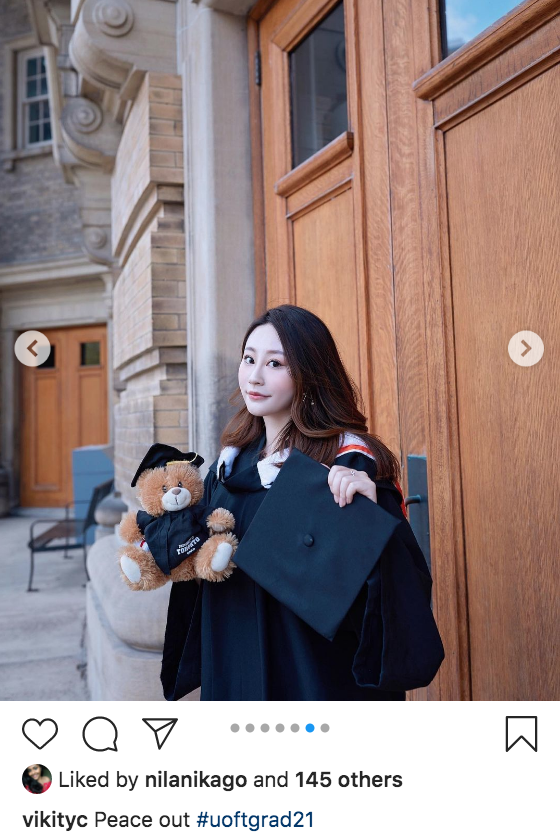 vikityc's instagram photo of her in graduation gown celebrating