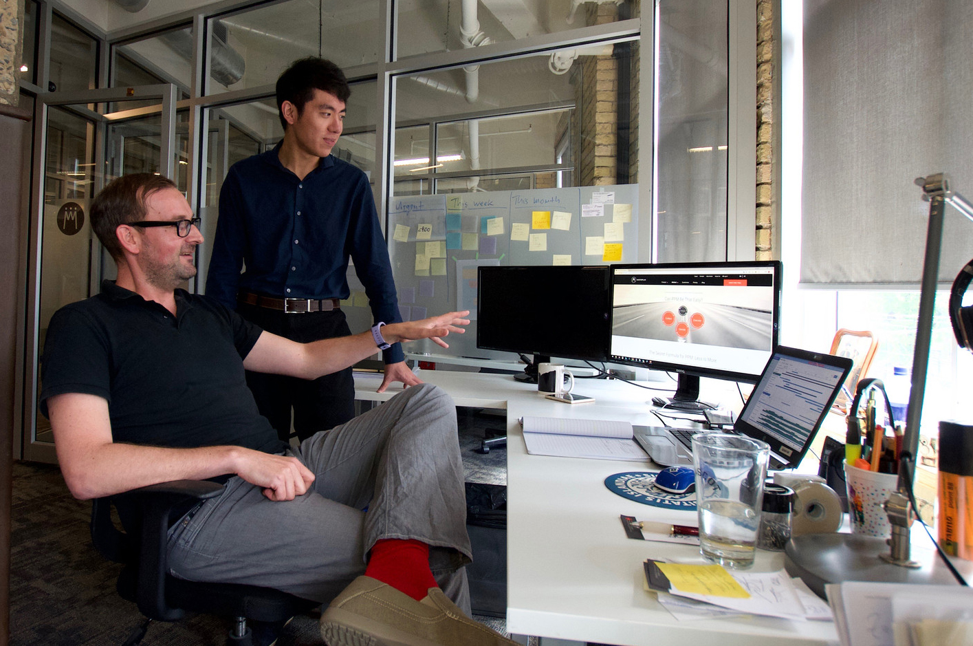 An Arts &amp; Science student working on his internship with his supervisor