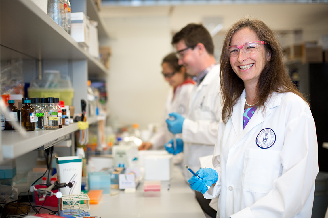 Molly Shoichet standing in a lab.