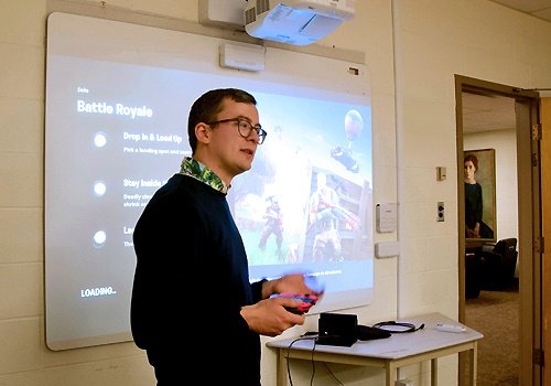 Assistant Professor Felan Parker engaging students with a lecture about video games.