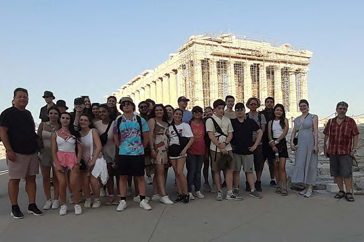 students in front of the acropolis