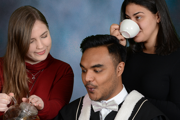 Al-amin Ahamed's friend pours tea into his cup