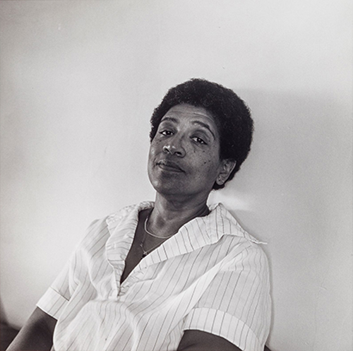 Black and white portrait of Audre Lorde.