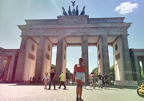 Shantel Watson standing in front of the Brandenburg gate.