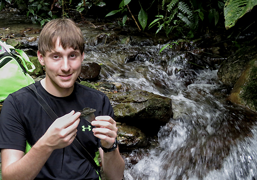 Chris Boccia holding lizard.