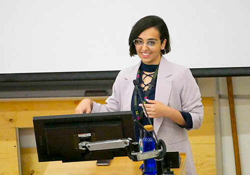 Aghagia Mokhber giving a classroom presentation