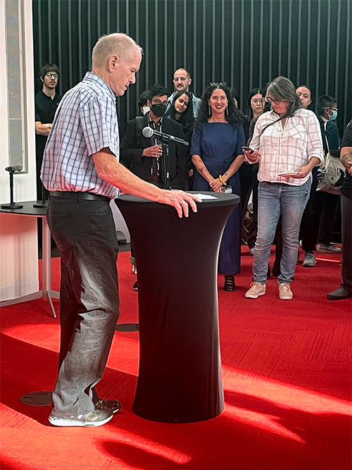 Former Bonham Centre director David Rayside at a podium.