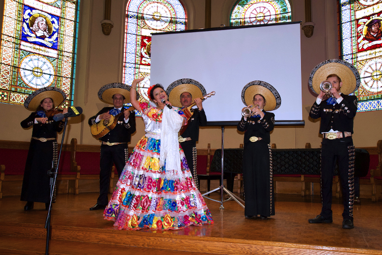 A Mariachi band on a stage.