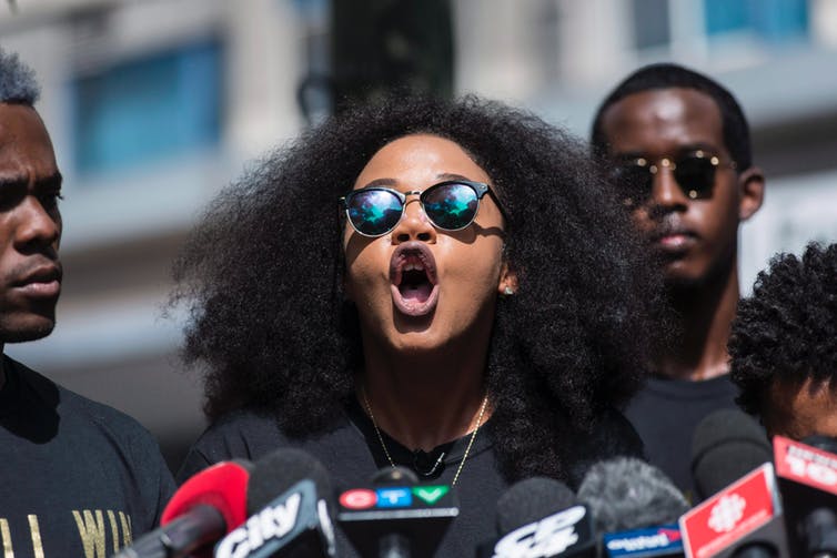 Alexandria Williams, of Black Lives Matter Toronto, speaks at a news conference