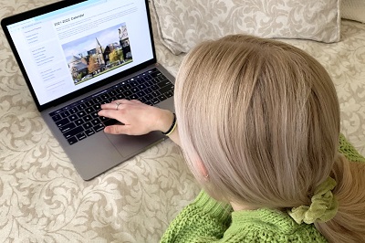 Woman looking at laptop