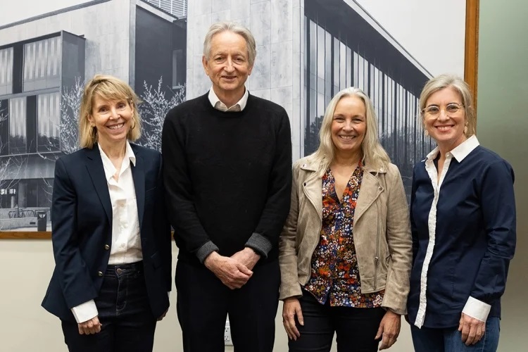 Standing left to right: Left to right: Sheila McIlraith, Geoffrey Hinton, Gillian Hadfield and Melanie Woodin