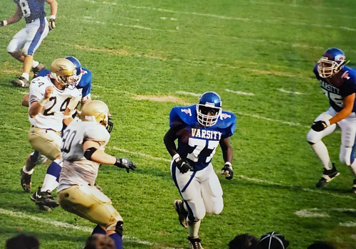 Julius Lindsay on the football field during a game.