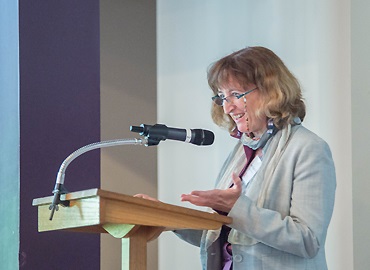 Karen Chapple at a podium