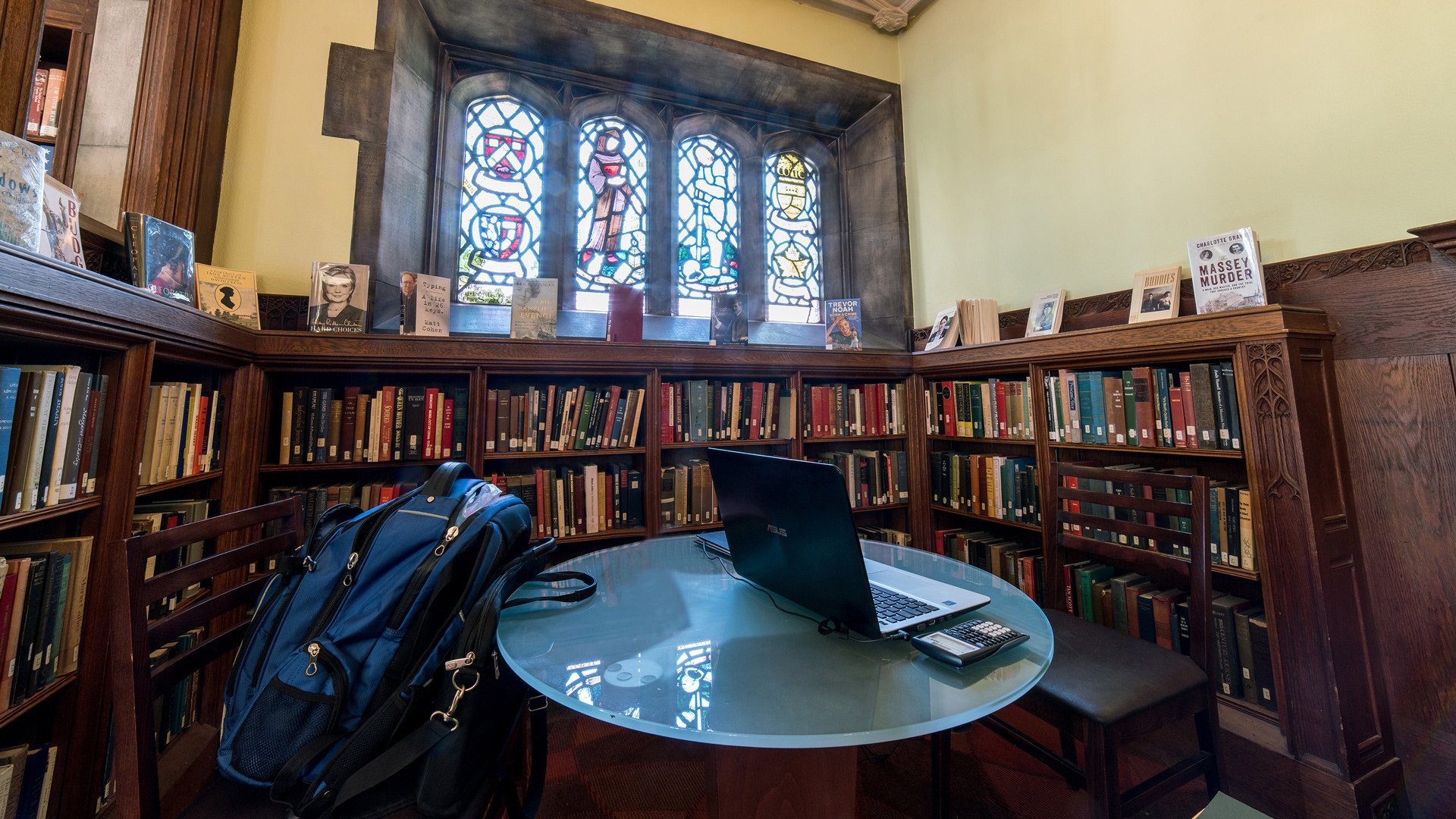 photo of round room with books along walls