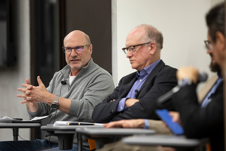 Mark Fox, David Wolfe, Peter Wittek and Mario Grech sit at a table