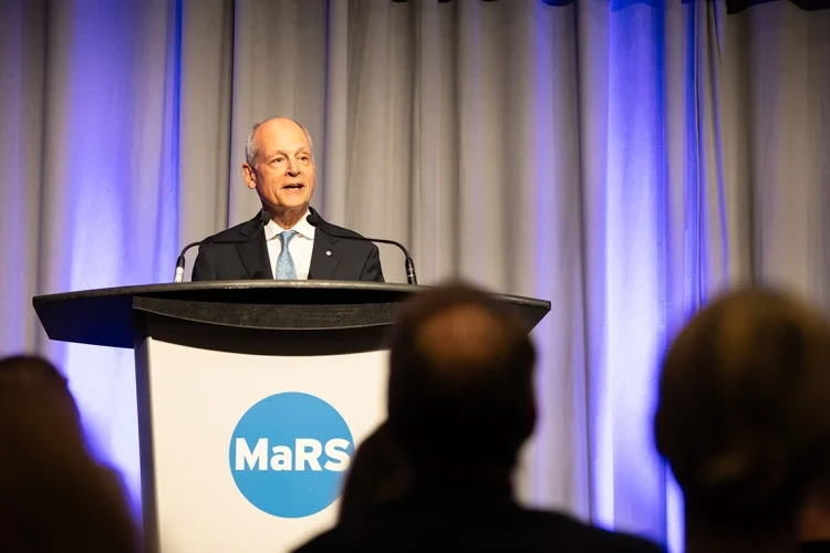 U of T President Meric Gertler speaking at a podium