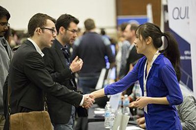 student meeting a presenter from a networking event