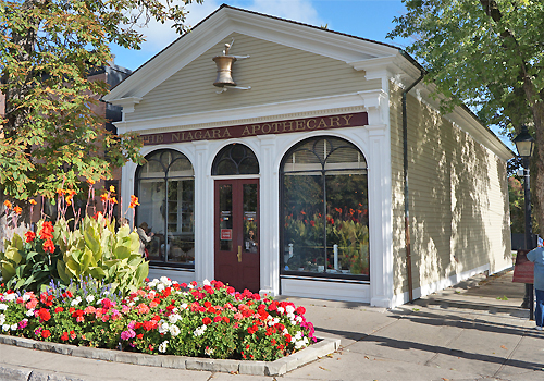 exterior of wooden 1869 pharmacy restored to its former beauty