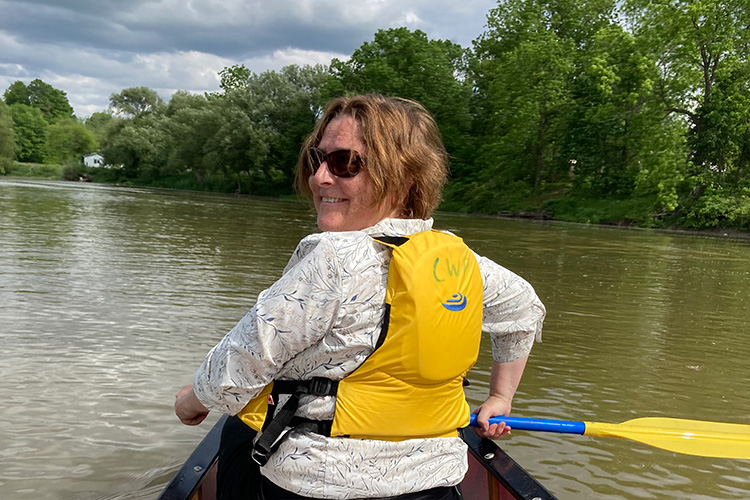 Melanie Jeffrey paddling in a kayak.