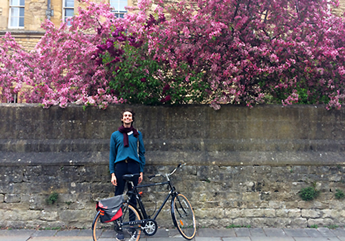 Philip Schwarz enjoys the crab apple and lilac blossoms on Queen’s Lane in Oxford.