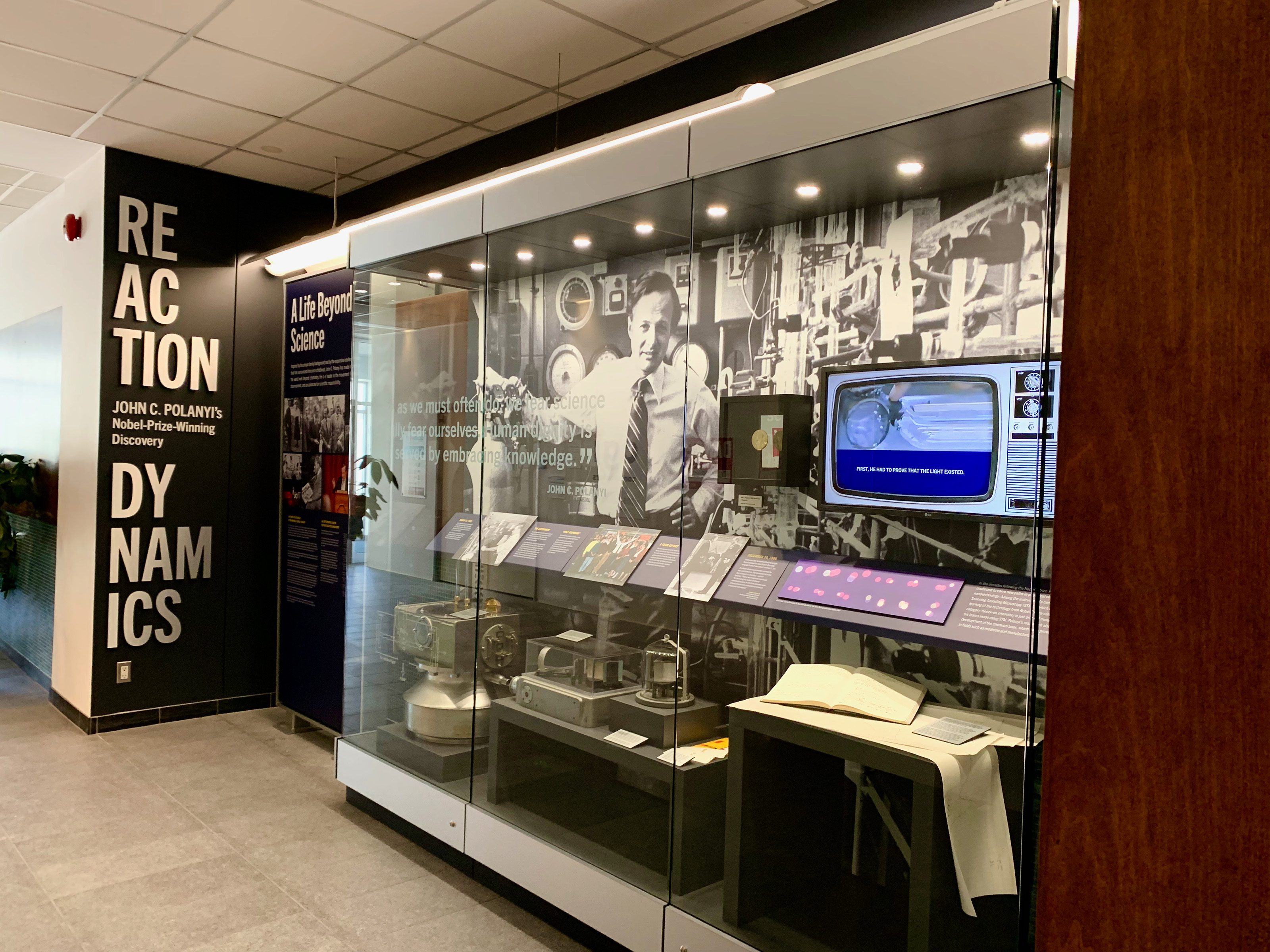 A museum display about John C. Polanyi's Nobel Prize winning research.