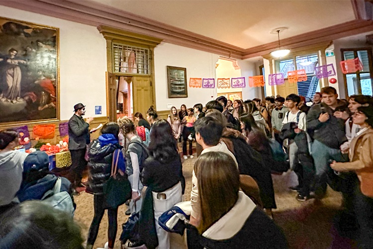 Students and faculty gathered at the Day of the Dead party