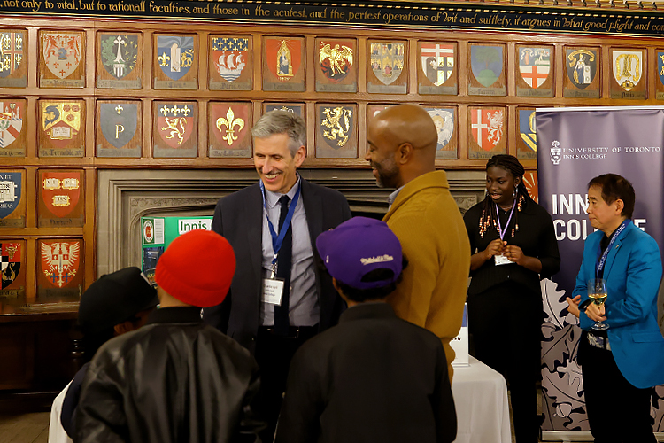 Charlie Keil engages with alumni and donors.