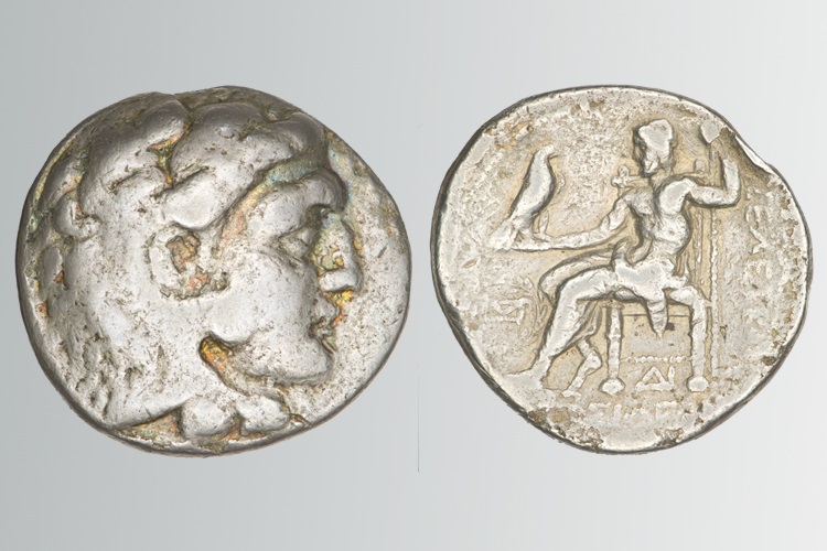  coin from the Hellenistic period (circa 300-295 BCE) with the head of a young Herakles and Zeus sitting on a throne holding an eagle.  