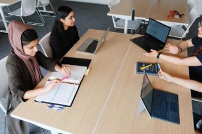 Students studying in the Sidney Smith Commons