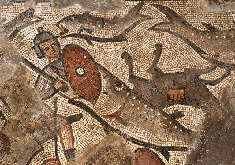Mosaic of the scene of the Parting of the Red Sea shows Pharaoh’s soldiers being swallowed by large fish, surrounded by overturned chariots with horses and chariot drivers.