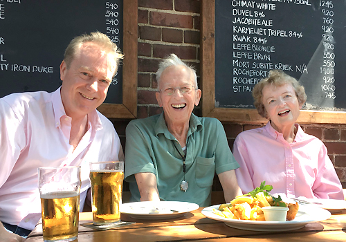 Rupert Hope (L) pictured with his Uncle George and Aunt Jennifer in a restaurant.